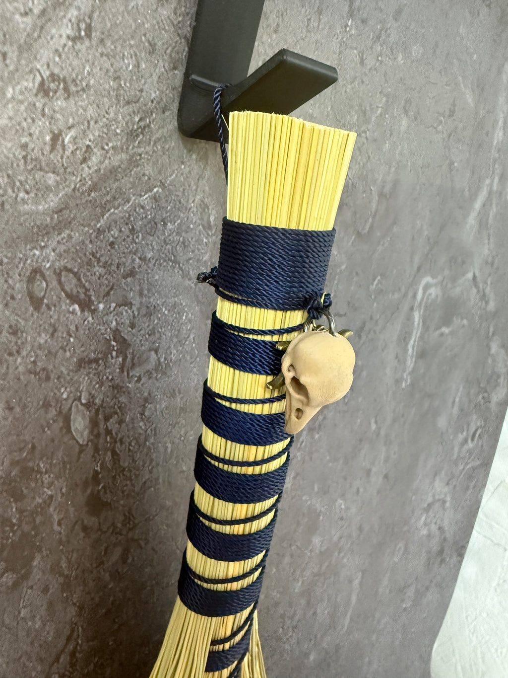 Hawks tail besom broom - Navy ravens head.