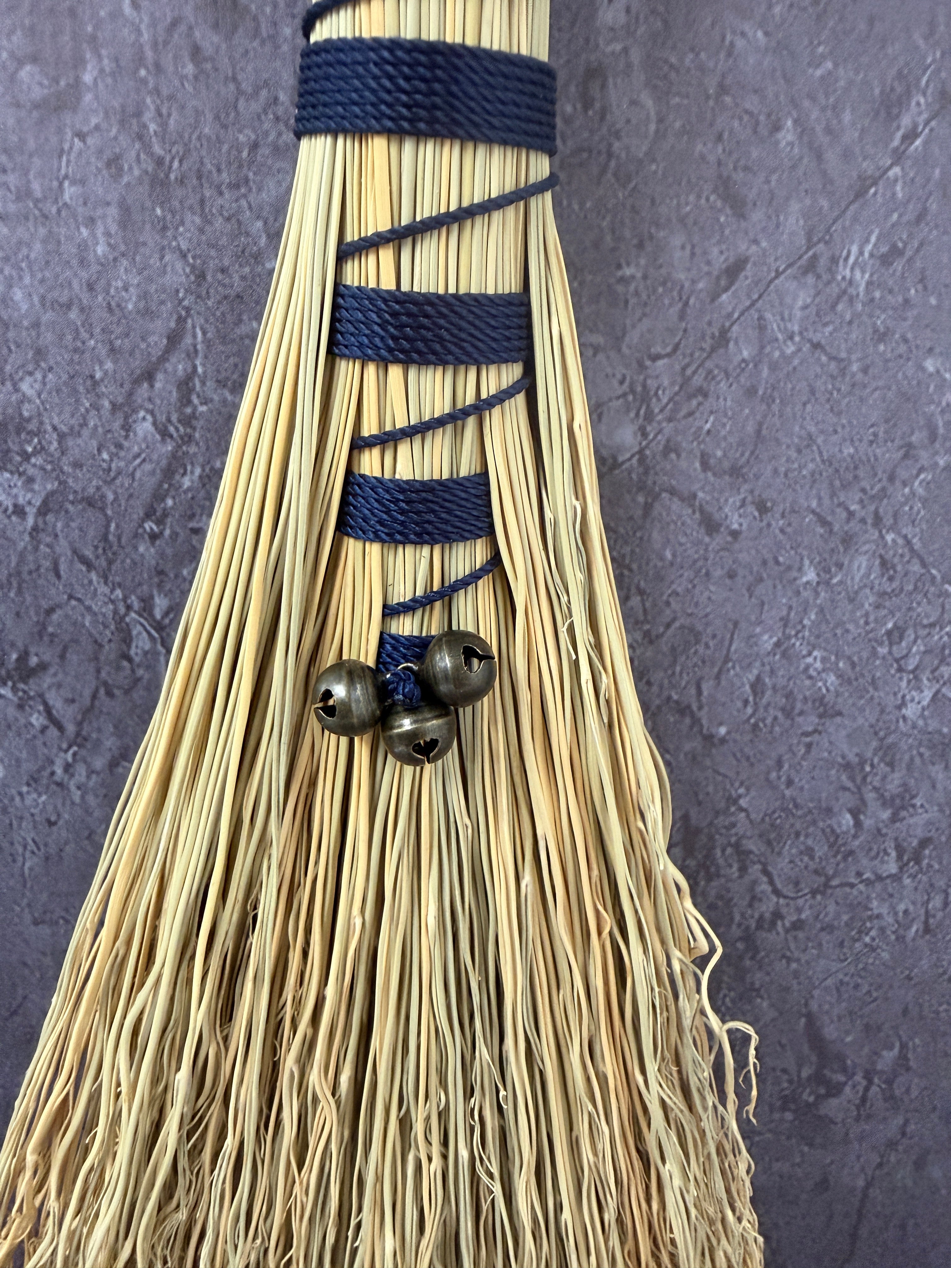 Hawks tail besom broom - Navy ravens head.